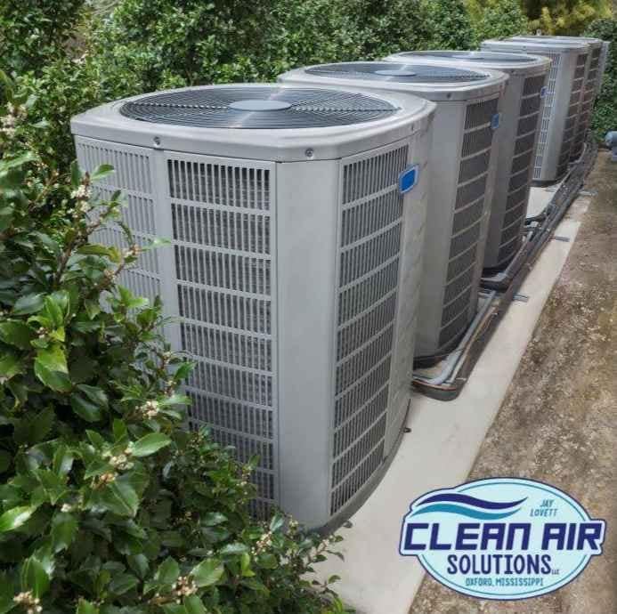 Clean Air Solutions HVAC technician resetting AC compressor in Oxford, MS